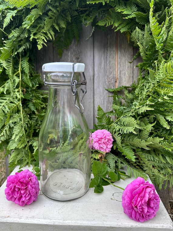 Old antique milk bottle with porcelain stopper glass bottle decoration vintage