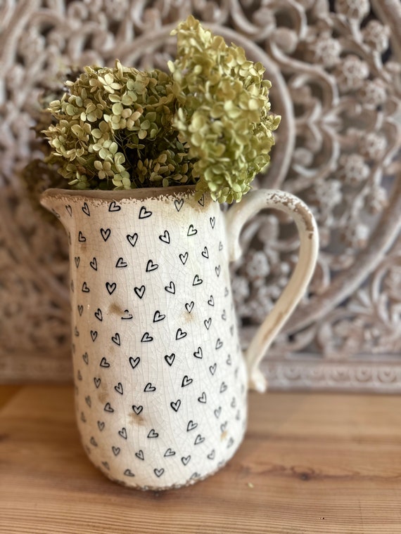 On old on antique jug ceramic jug decoration vintage
