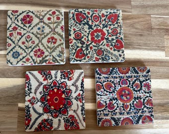Coaster tiles made of tumbled marble in a set of 4 pieces