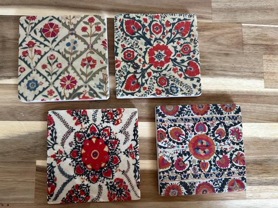 Coaster tiles made of tumbled marble in a set of 4 pieces