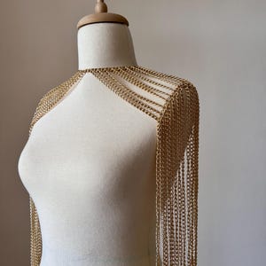 Clutch Geel Gevlochten Leer met Gouden Details