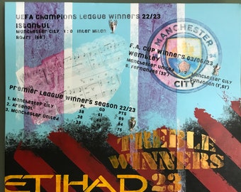 Manchester City treble winners