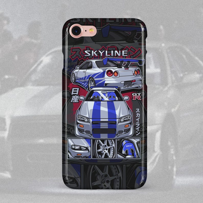May include: A black iPhone case with a white and blue illustration of a Nissan Skyline GT-R. The case features the Japanese text "SKYLINE" and "GT-R" in red and white. The case also features a close-up of the car's wheels and headlights.
