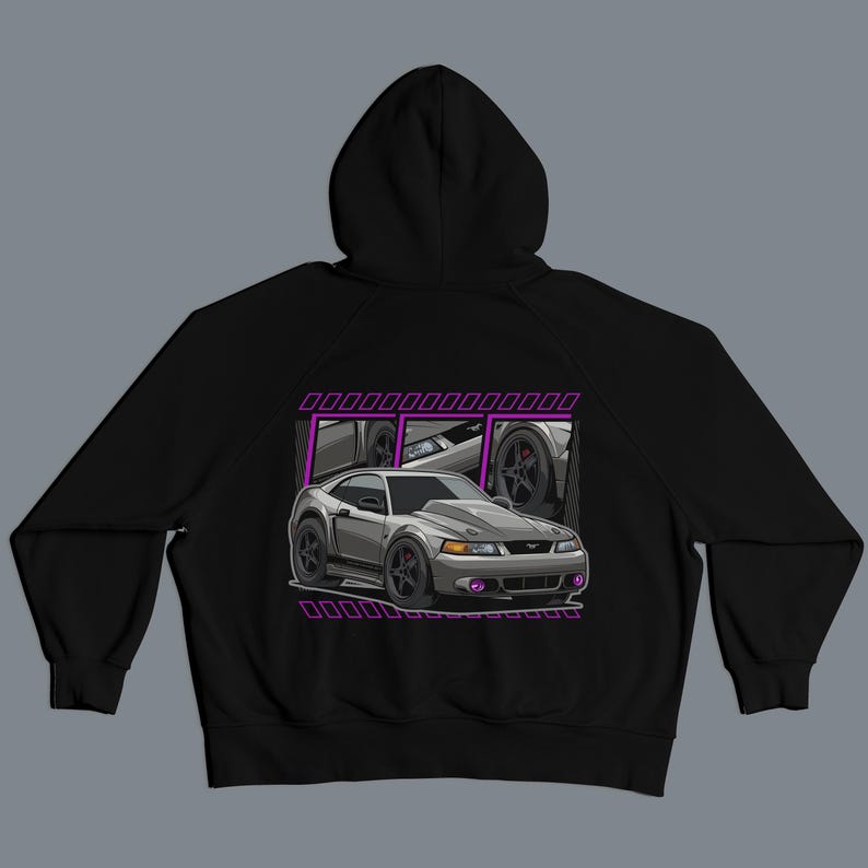 May include: Black hooded sweatshirt featuring a graphic of a gray sports car with purple accents. The car illustration is set against a purple rectangular frame. The design includes details of the car's wheels and headlights.