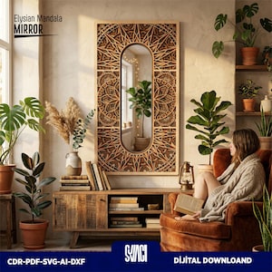 May include: A decorative wooden mirror with an oval-shaped mirror and intricate mandala design. The mirror is framed in light wood and the text "Elysian Mandala MIRROR" is visible. The image also shows a wooden cabinet, plants, and a person reading.