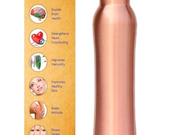 May include: A copper water bottle with a screw-on cap. The bottle is a shiny, warm copper color. Next to the bottle is a vertical panel with text and illustrations about the benefits of drinking water from a copper vessel.