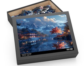 May include: A puzzle box with a scenic image of a lake and traditional Asian architecture. The box is open, revealing puzzle pieces. The image features a lake, mountains, and a building with a red and blue roof. The box reads "16x20 Puzzle 500 pcs Ages 9+". The box measures approximately 40.6 x 50.8 cm.