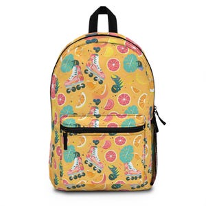 May include: Yellow backpack with a repeating pattern of pink roller skates, citrus fruits, and green leaves. The backpack has a black zipper, a black handle, and a black mesh side pocket. The design is bright and colorful.