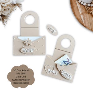 Può includere: Porta carte regalo beige con manico ad anello, con decorazioni a forma di cuore e puzzle. Un supporto ha il testo "BE MY VALENTINE". Un altro ha il testo "EINE KLEINIGKEIT FÜR DICH". L'immagine include anche il testo "3D Druckdatei STL 3MF Geld-und Gutscheinhalter Flaschenhalter".