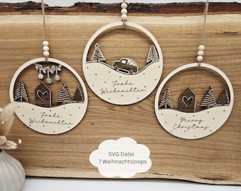 May include: Three wooden Christmas ornaments with a winter scene design. The ornaments are round and have a hole at the top for hanging. The ornaments are decorated with a house, trees, and a truck carrying a Christmas tree. The text on the ornaments reads "Frohe Weihnachten" and "Merry Christmas".