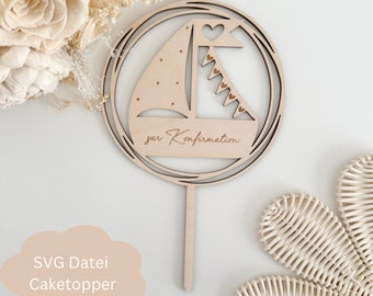 May include: Wooden cake topper with a sailboat design and the text "zur Konfirmation". The sailboat has a heart on the sail and a string of flags with hearts.