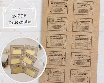 Op de afbeelding: Een set van 10 bruine papieren kaarten met zwarte tekst en afbeeldingen. De kaarten hebben een verscheidenheid aan nieuwjaarsboodschappen, zoals "Rubbel dein Neujahrsglück frei" en "Was das neue Jahr für dich bereit hält".