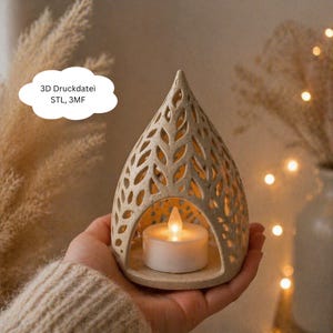 Könnte beinhalten: Ein beigefarbener Kerzenhalter aus Keramik mit einem Blattmuster und einer kleinen LED-Kerze im Inneren. Der Halter hat eine tropfenförmige Form mit ausgeschnittenen Details. Der Text auf dem Bild lautet "3D Druckdatei STL, 3MF".