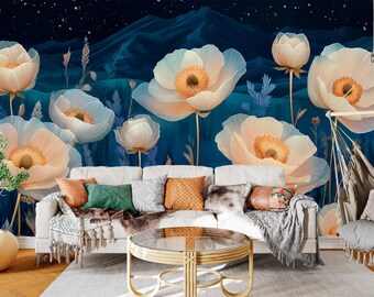 May include: A living room featuring a white sofa and a coffee table. The wall is adorned with a mural depicting white flowers against a blue backdrop with stars.