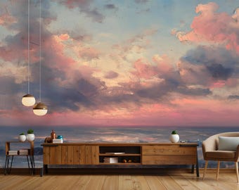 Könnte beinhalten: Ein Konsolentisch aus Holz mit zwei Schubladen und zwei offenen Regalen. Der Tisch steht vor einer Wandmalerei, die eine Meereslandschaft mit rosa und blauen Wolken bei Sonnenuntergang darstellt.