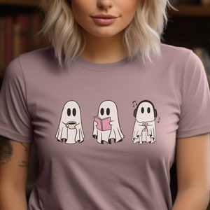 Nerdy Ghost Graphic Shirt, Cute Ghost Reading, Drinking Coffee and Listening to Music shirt, Nerdcore Spooky Ghost shirt, Coffee& Book Lover