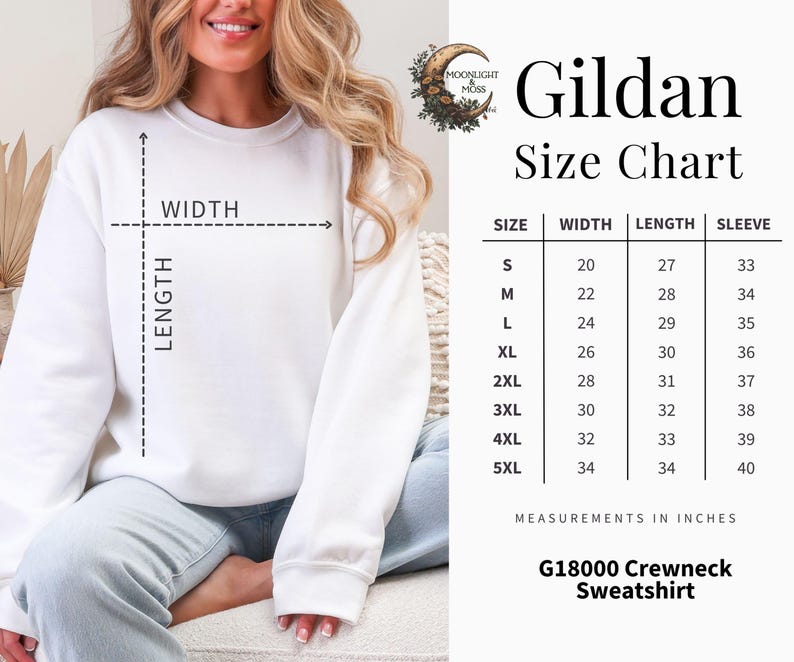 Może przedstawiać: Biała bluza dresowa Gildan z okrągłym dekoltem i tabelą rozmiar&oacute;w. Tabela zawiera wymiary w calach dla rozmiar&oacute;w od S do 5XL, w tym szerokość, długość i długość rękawa. Bluza to G18000.