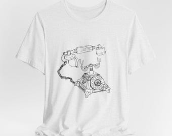 May include: A white t-shirt with a black line drawing of an old-fashioned rotary phone.