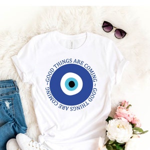 Evil Eye T-Shirt, Spiritual Protection Tee, Good Things Are Coming Shirt, , Mystical Travel Shirt, Santorini Evil Eye Gift, Positive Quotes