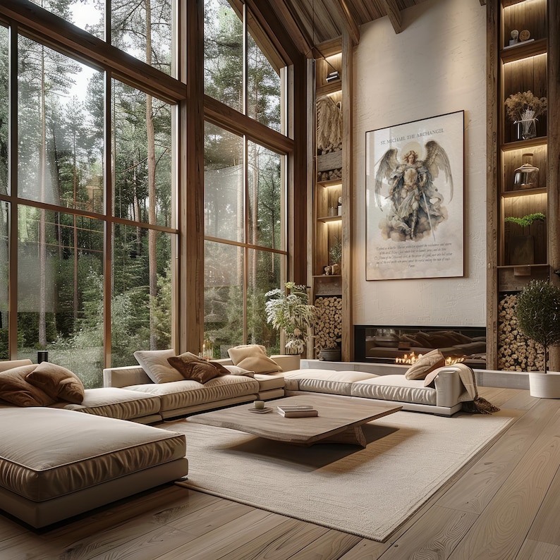 May include: A spacious living room with large windows overlooking a forest. The room features a beige sectional sofa, a wooden coffee table, and a fireplace. A framed artwork hangs above the fireplace. The room has wooden shelves and a light-colored rug.