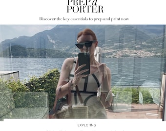 May include: A woman wearing a black and white striped swimsuit and sunglasses is taking a selfie in front of a lake. She is holding a black phone in her right hand and a brown tote bag in her left hand. The text "Chic Diaper Bag Essentials for The Modern Parent" is displayed below the image.