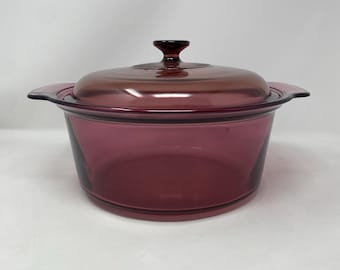 Vintage Corning Ware Pyrex 5 Liter Cranberry Glass Round Dutch Oven with Lid. Preowned.