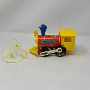 Vintage Fisher Price Toot Toot Train Engine Pull Toy, #643, 1964.