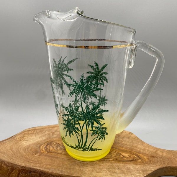 Blendo vintage pitcher from West Virginia Glass Company. Yellow ombré palm tree pitcher. Preowned without cracks or chips. Holds 28 ounces