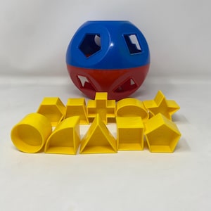 Vintage Tupperware Shape-O Ball Shape Sorter. Developmental Toy. Comes with all 10 Shapes. Preowned.