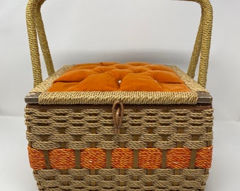 Vintage Sewing basket. Tag states “The Sewing Room Sewing Basket Made for in Japan Especially for Leewards, Elgin, ILL”. Wicker, wood, satin