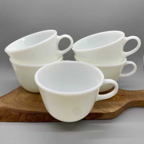 Pyrex White Opal Vintage Coffee/Tea Cups. Set of 5. Preowned without chips or cracks. Heavy and sturdy. Great for everyday use or to collect