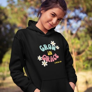 May include: Black hoodie with a white daisy graphic and the text "Grow in Grace 2 Peter 3:18" in colorful letters.