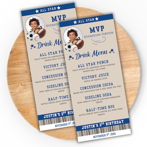 May include: Two custom drink menu cards with a sports theme. Each card features a child's photo, football and soccer ball graphics, and the text "Drink Menu." The menus list drink options and are set on a wooden surface.