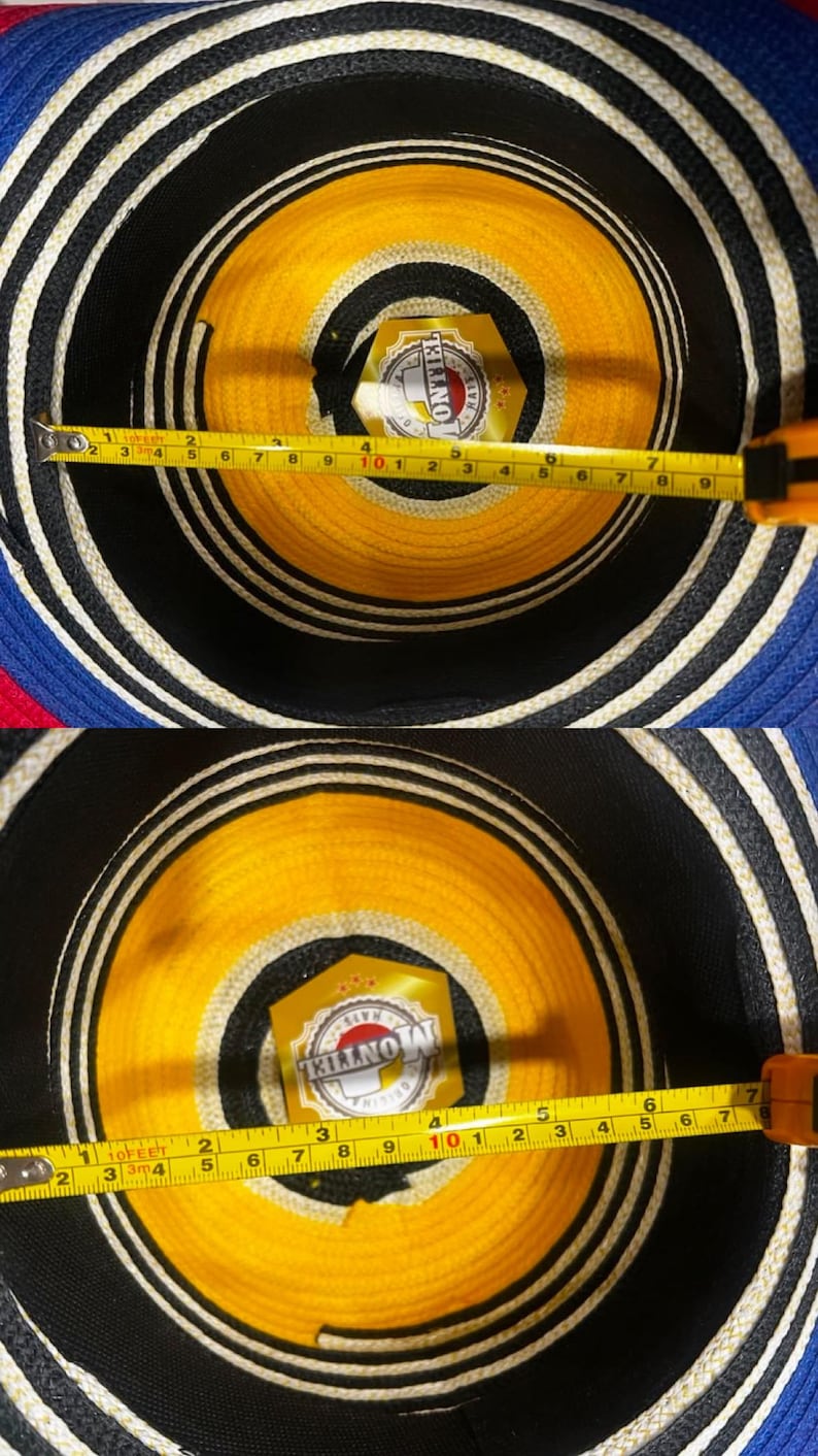 May include: A woven hat with concentric rings of blue, black, white, and yellow. A yellow label with the text MONTIEL HATS is visible inside. A yellow measuring tape shows the interior diameter is approximately 7.5 inches across the center.