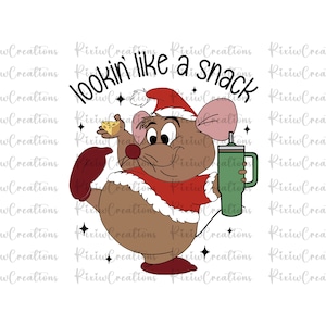 May include: A cartoon mouse wearing a Santa hat and holding a piece of cheese. The mouse is wearing a red and white Santa suit and is holding a green tumbler. The text "Lookin' like a snack" is written above the mouse.
