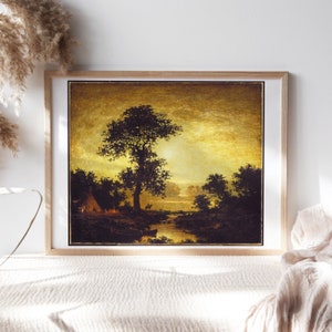 May include: A painting depicting a landscape scene with a large tree in the foreground, a river winding through the scene, and a small tent in the distance. The sky is a golden yellow color, and the sun is setting in the distance. The painting is framed in a wooden frame.