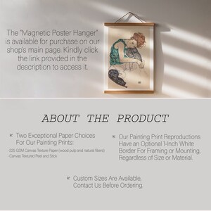 May include: A framed print of a woman in a green dress and black pants sitting with a black cat. The print is hanging on a white wall with natural light shining through the window. The text "ABOUT THE PRODUCT" is below the print.