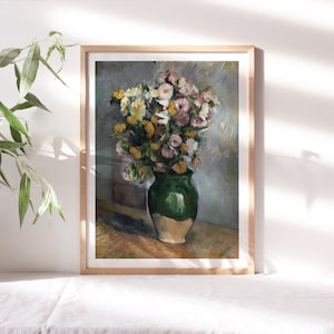 May include: A painting of a bouquet of white, yellow, and pink flowers in a green ceramic vase. The vase is sitting on a wooden table. The background is a light blue.