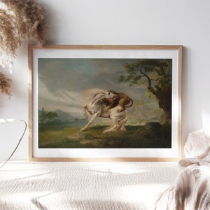 May include: A painting depicting a white horse being attacked by a lion. The horse is rearing up on its hind legs, while the lion is clinging to its back. The scene is set in a grassy field with a mountain range in the background.