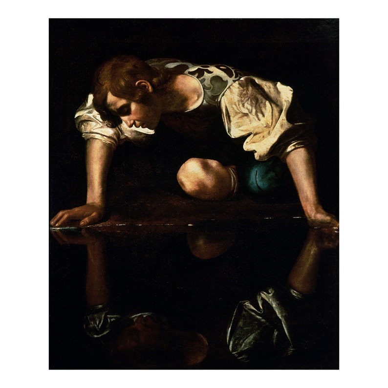 May include: A young man in a white and yellow shirt and blue pants leans over to look at his reflection in a pool of water.