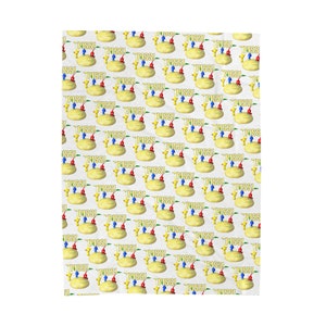 May include: A white background with a repeating pattern of yellow cakes with red, blue, and yellow candles. The candles have the word "PISS!" written on them.