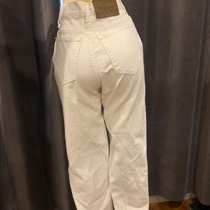 true vintage Calvins made in USA 90er Jahre Calvin Klein Jeans Denim Ivory Cream mit Lederschild