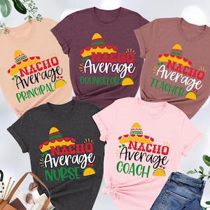 May include: Five t-shirts with a funny design featuring a sombrero and the text "Nacho Average" followed by a job title. The job titles are Principal, Counselor, Teacher, Nurse, and Coach.