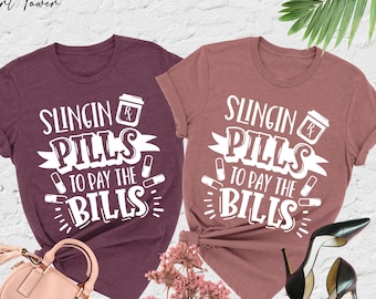 Slingin Pills To Pay The Bills Shirt, Funny Pharmacist Shirt, Pharmacy Tech Shirt, Pharmacy School Shirt,Nurse Life Shirt,Nursing School Tee