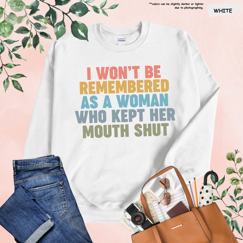 a white shirt with the words i won't be remembers as a woman who