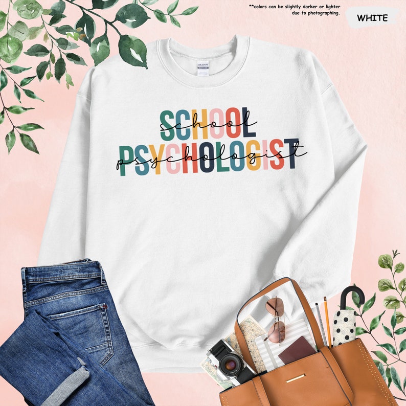 a white sweatshirt with the words school psyholologist on it