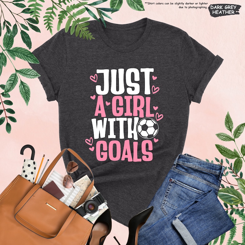 a t - shirt that says just a girl with goals