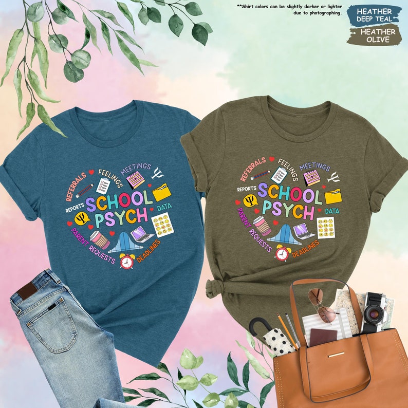 May include: Two t-shirts featuring a school psychologist design. The design includes a speech bubble with the words "School Psych" and other relevant icons, such as a calendar, a folder, a coffee cup, a laptop, and a bell. The t-shirts are available in teal and olive green.