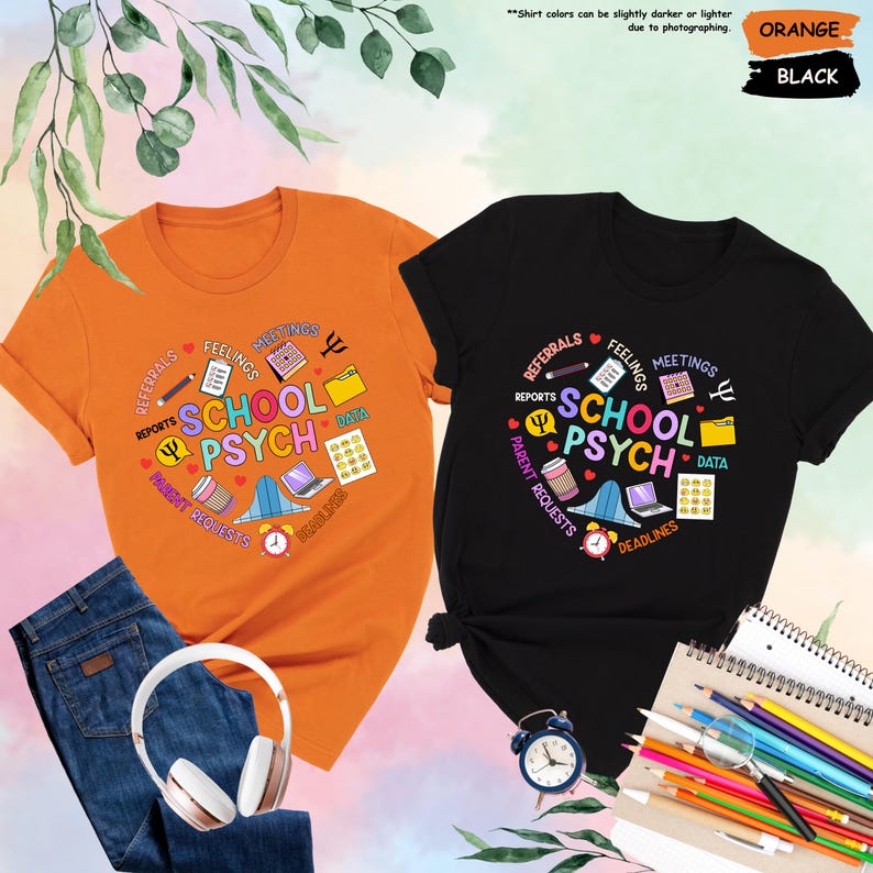 May include: Two t-shirts, one orange and one black, featuring a graphic design representing the work of a school psychologist. The design includes icons such as reports, referrals, feelings, meetings, data, deadlines, and parent requests. The text "School Psych" is at the centre of the design.