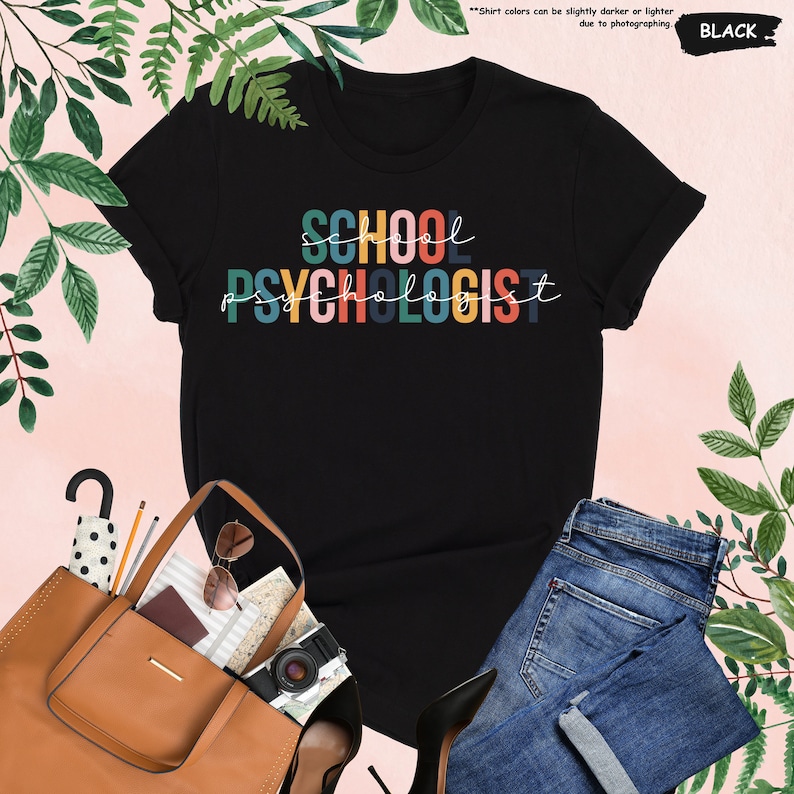 a t - shirt that says school and a purse